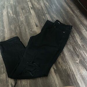 Mid rise boyfriend jeans with holes on the knees